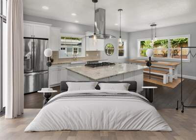 Beautiful kitchen in new home, with stainless steel appliances and eating nook Wall mural