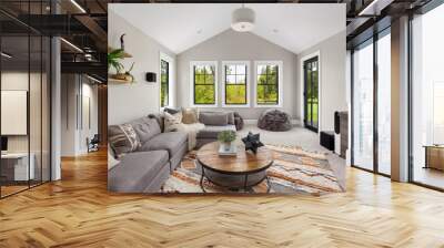 Beautiful living room in new luxury home. Features L shaped sectional sofa, area rug, and elegant decor	 Wall mural