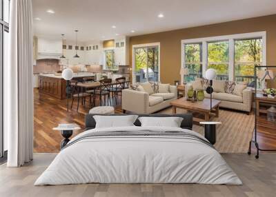 Beautiful living room interior with hardwood floors and view of kitchen in new luxury home Wall mural