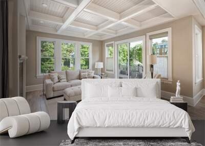 beautiful living room with hardwood floors in new luxury home. coffered ceiling adds elegant touch t Wall mural