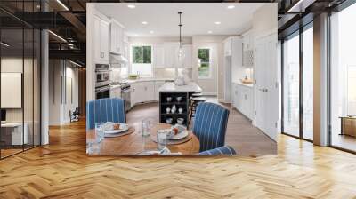 Kitchen and dining area in new luxury home. Features kitchen island, table with place settings, stainless steel appliances, and pendant lights. Wall mural