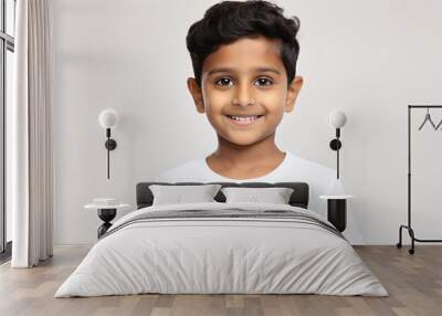 portrait of an indian boy with  short black hair isolated against a white background Wall mural