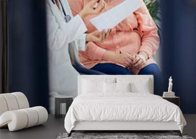 A woman plus size is sitting with a female nutritionist in the ambulance. Wall mural