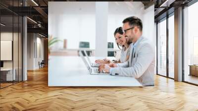 image of two successful business partners working in the office Wall mural