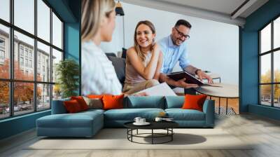 Portrait of a smiling business team working. Wall mural