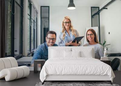 Portrait of a smiling casual business team. Wall mural