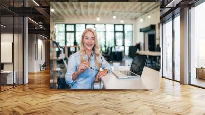 Portrait of successful entrepreneur at work. Wall mural