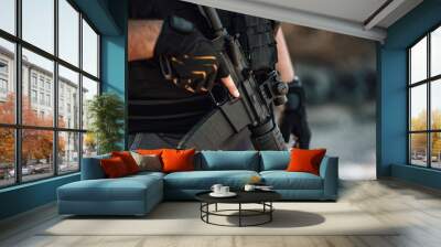 private security concepts. close-up image of a man with rifle. Wall mural