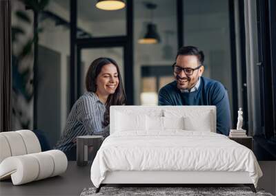 Smiling people, in the meeting room, using a laptop, searching s Wall mural