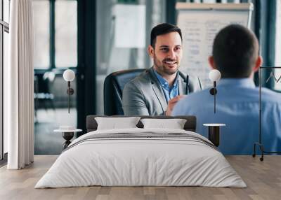 Two business men on meeting. Wall mural