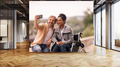 Two lovers, smiling face, enjoying outside. Wall mural