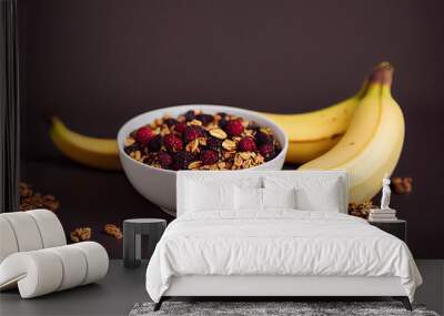 Açaí bowl with granola, tropical fruits, banana, strawberry, raspberry, condensed milk and cereal. Selective focus. Close up Wall mural