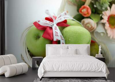 basket of green apples on white background Wall mural