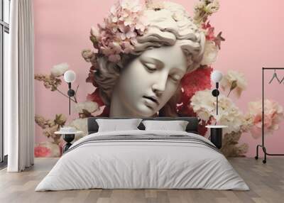 Antique female sculpture and flowers. Wall mural