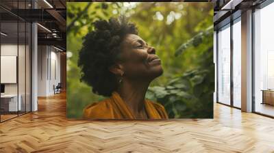 Beautiful mature black woman enjoying nature in a forest	 Wall mural