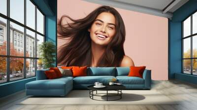 Beautiful smiling brunette woman with healthy shiny long hair Wall mural