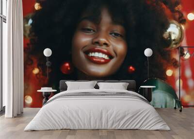 Portrait of smiling beautiful young black woman celebrating Christmas Wall mural