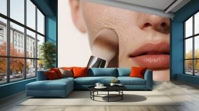 Young beautiful woman applying skin foundation with brush	 Wall mural