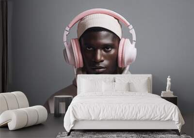 Young man with headphones listening to music.  Wall mural