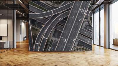 Aerial view of highway and overpass in city on a cloudy day Wall mural