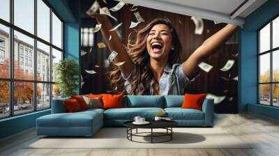 Smiling young woman money banknotes flying in air around Wall mural