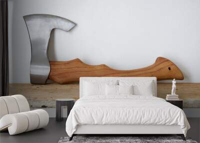 Viking axe on a wooden table Wall mural