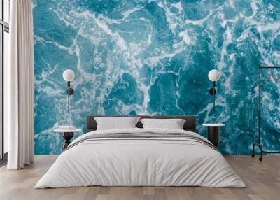 Abstract blue sea water with white foam and bubbles for background, nature background concept Wall mural