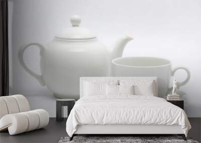 Teapot and Cup A ceramic teapot with a matching teacup both whit Wall mural