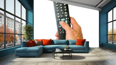 Hand hold remote control and pressing button Wall mural