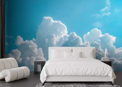 Fluffy white clouds on blue sky Wall mural