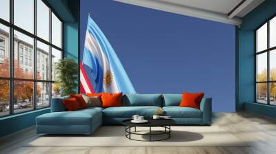 Flags of United States and Argentina on flagpoles on the side. Flags on a blue background. Place for text. United States of America. Buenos Aires, South America. Commonwealth. 3D illustration. Wall mural