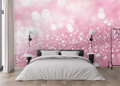 A soft pink background with sparkling glitter, creating a dreamy and festive atmosphere. Wall mural