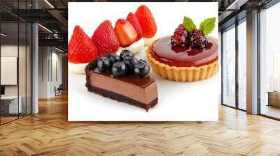 A tempting assortment of desserts featuring chocolate cake and fruit tarts. Wall mural