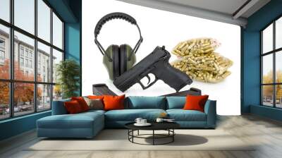 Pistol, ear protection and ammunition. Isolated on white background with shadow reflection. Gun, earmuffs, magazines and bullets 9mm stacked in bags on white backdrop. Wall mural