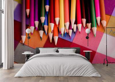 Children wooden crayons in 25 colors on colorful background Wall mural