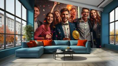 Group of beautiful and young business people celebrating their team success. Wall mural