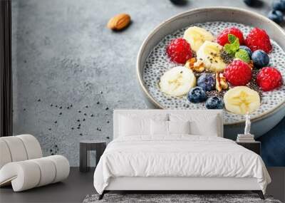 Chia Seed Pudding with Banana  Raspberries  Blueberries and Nuts Wall mural