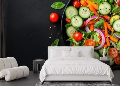 Fresh Green Salad with Cucumber  Tomato  Carrot  Red Onion  Basil  and Sesame Seeds on Black Background Wall mural