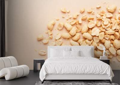 Shelled Peanuts on Tan Background  Top View  Close up Wall mural