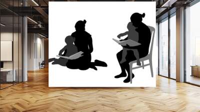 mother reading book to child silhouettes - vector Wall mural