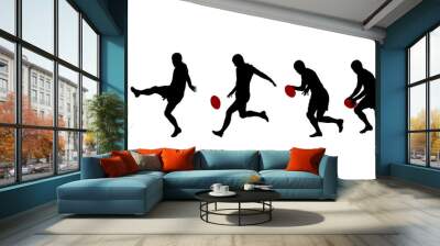 rugby player kicking ball in four steps silhouettes Wall mural