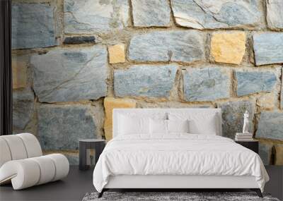 Texture of a stone wall, roads from stones, bricks, cobblestones, tiles with sandy seams of gray ancient natural old yellow with sharp edges. The background Wall mural