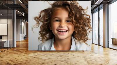 Portrait of a happy smiling laughing child girl Wall mural