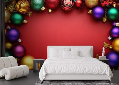 A Festive Christmas Ornament Border Around a Red Background Wall mural