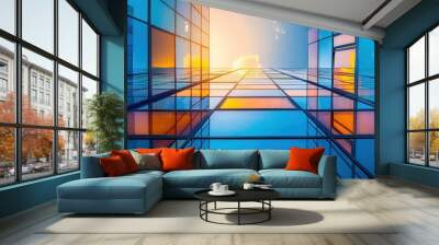 Modern office building with glass facade against blue sky at sunset, real estate concept. Wall mural