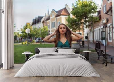 Fashionable woman in european city Wall mural