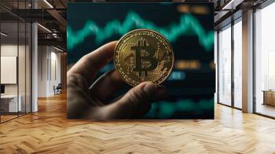 Bitcoin Cryptocurrency Coin Held Over Green Financial Chart Wall mural