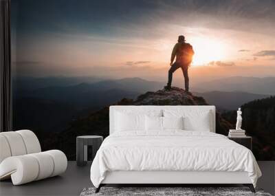 Tourist man hiker on top of the mountain. Active life concept Wall mural