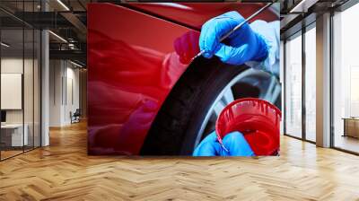 Tinting defects of a red car paint on the service Wall mural