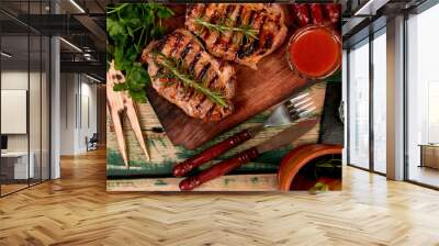 Banner with Steak pork grill on wooden cutting board with a variety of grilled vegetables Wall mural